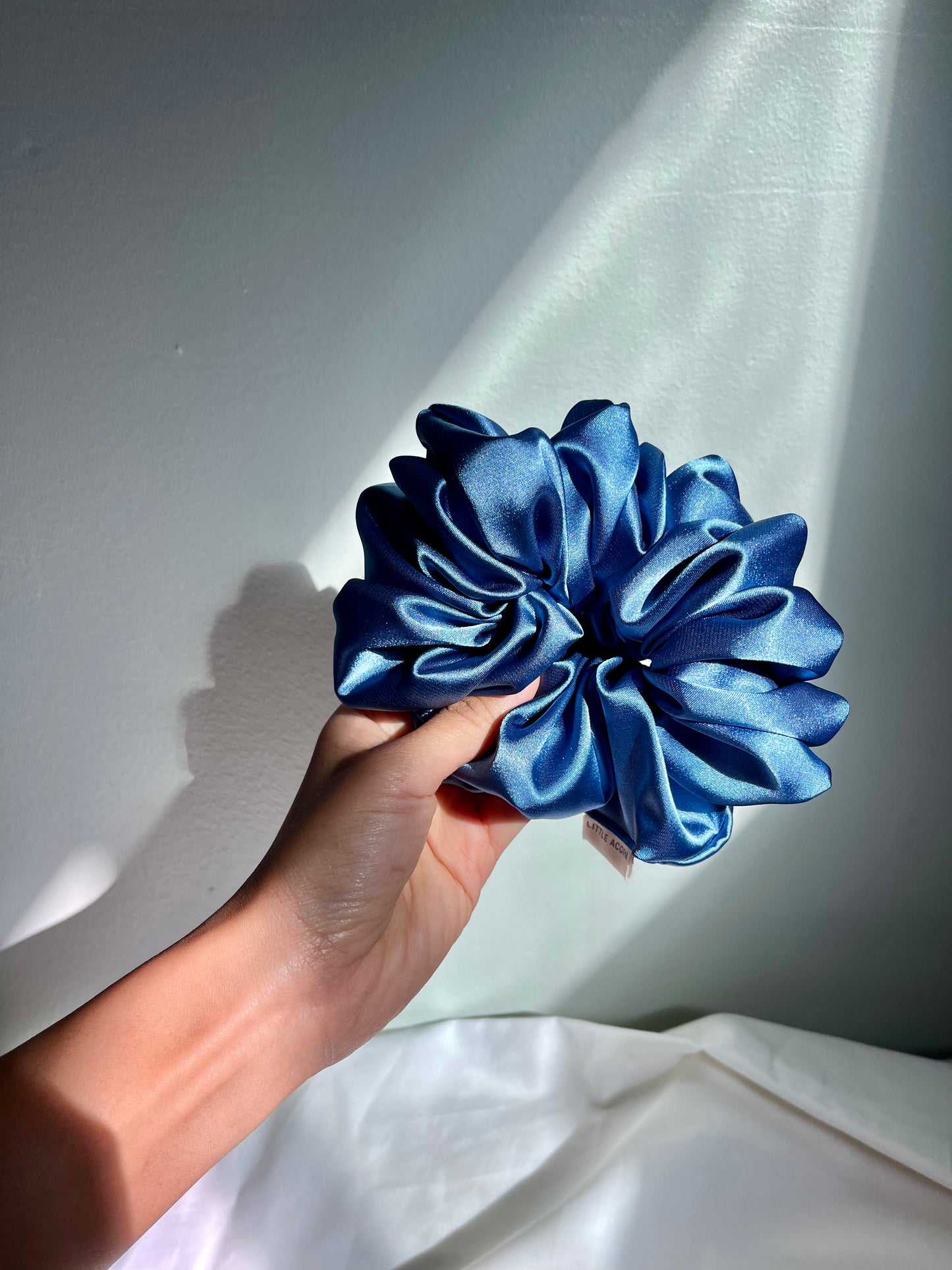 Light blue satin scrunchie