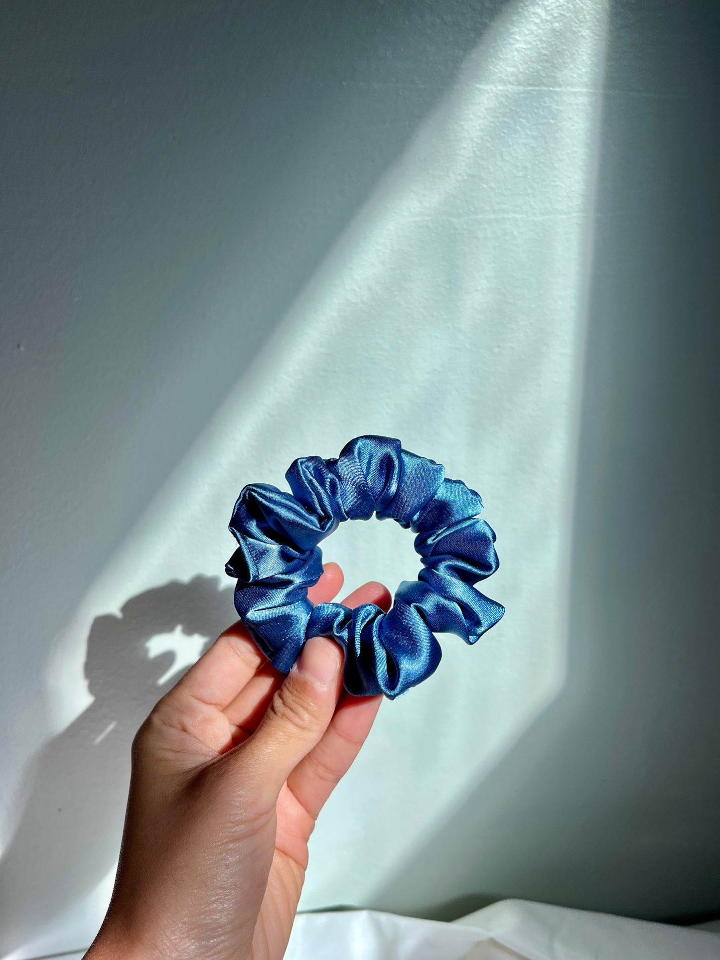 Light blue satin scrunchie